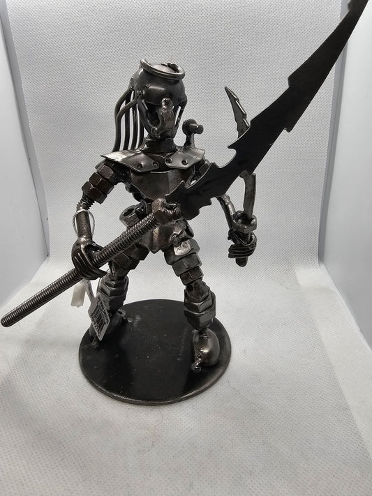 Dual Wielding Predator with Spear Inspired Recycled Metal Sculpture